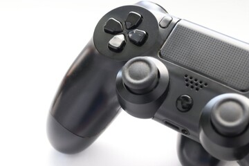 Game joystick close up, Modern black game controller - ergonomic gaming accessory for console, game controller on white background, joystick on white background, gamepad