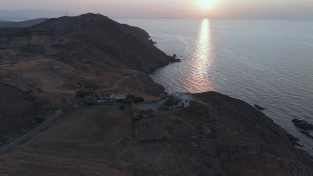 A drone flight across the rough and dry coast line at the north of Crete island close to the city of Heraklion 