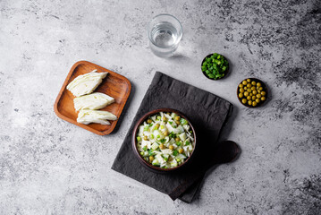 Cabbage cucumber green peas mayonnaise salad in a bowl