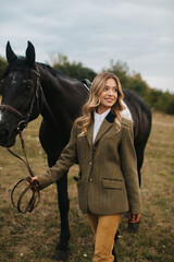 Woman with Horse in a Field During an Outdoor Equestrian Day