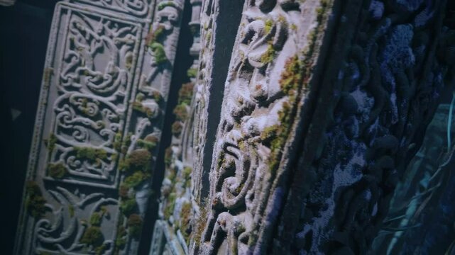 interior scenes of abandoned ruins underwater, walls and pillars made of lapis lazuli, crumbling scenes, dim light