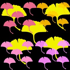 Colorful ginkgo leaves pattern on black background in abstract design  