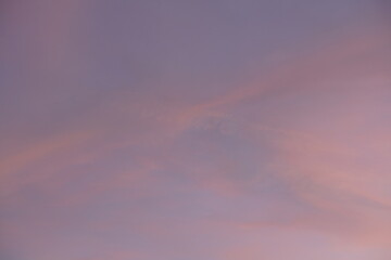 Stronger structured, beautiful bright quiet evening cloudy sky with purple, magenta and orange with blue colors