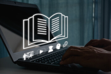 Person using laptop for online education and e-learning with digital book icon, studying course,...