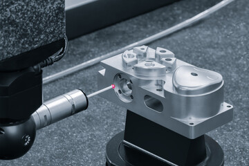 Quality control on milling metal CNC machine, coordinate measuring machine tests a metal detailt,...