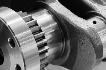 Engine crankshaft close up, car engine service concept background
