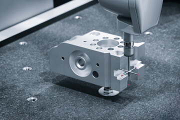 Quality control on milling metal CNC machine, coordinate measuring machine tests a metal detailt,...