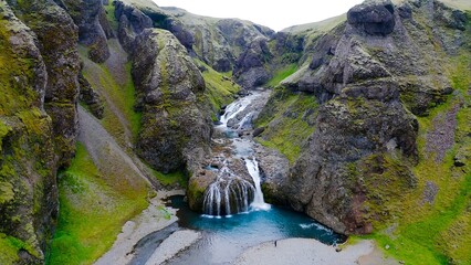 Aerial view of the spectacular Stjornafoss gorge and waterfall, a rustic wonder found in Kleifar,...