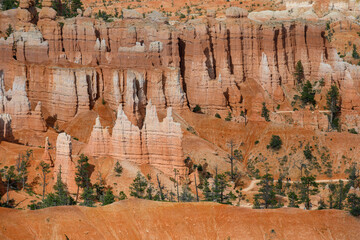 View from canyon rim of hoodoos and the queens loop hiking trail, summer vacation exploring in Bryce Canyon National Park, Utah
