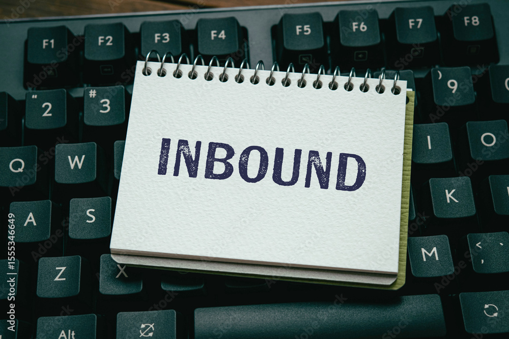 Aufkleber there is notebook with the word inbound. it is as an eye-catching image.
