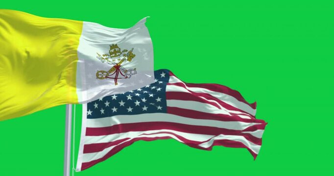 Vatican city flag waving with the American flag isolated on green background