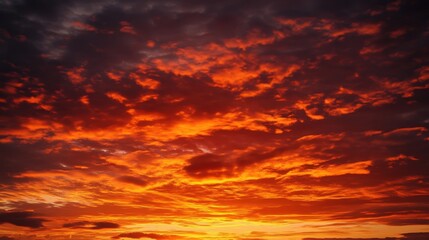 Stunning sunset sky with vibrant orange and red clouds creating a beautiful evening atmosphere for relaxation and reflection.