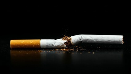 Broken Cigarette on Black Background