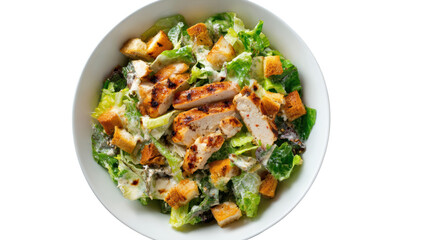 Delicious Caesar salad with grilled chicken, crispy croutons, and fresh lettuce on a white isolate background.