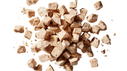 Pile of small, cubed pieces of dried plant-based protein on a white isolate background.