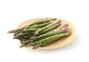 Fresh raw asparagus spears isolated on white