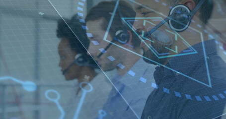 Monitoring man in navy button-down shirt using digital interface at office desks, copy space