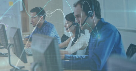 Handling customer calls using headsets and monitors while analyzing data overlays in open office