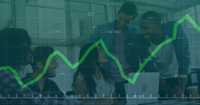 Collaborating five professionals analyzing laptop screen in conference room with line chart overlay