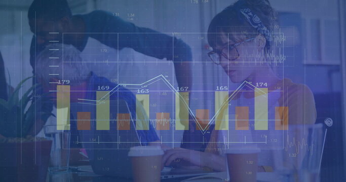 Reviewing team of five analyzing holographic financial charts in office, with laptop and coffee