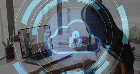 Cloud security image over person working on laptop at home