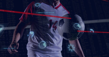 Displaying soccer ball, player wearing white jersey in front of goal net, with digital HUD overlays