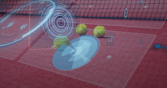 Displaying three yellow tennis balls floating on clay court, with digital overlays and tennis net