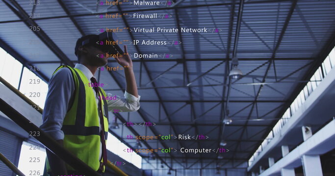 Talking engineer wearing vest hardhat using smartphone on factory catwalk, code overlay, copy space