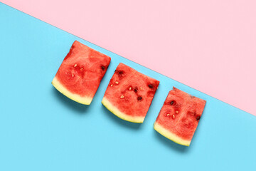 Pieces of fresh watermelon on colorful background