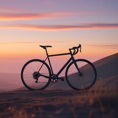 Fototapeta premium Bicycle silhouette parked on a hilltop during sunset, panoramic landscape with warm tones, peace background copy space