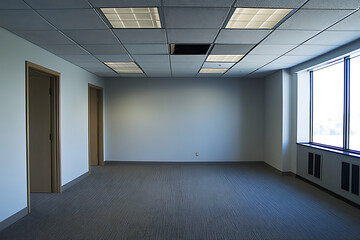 Fototapeta premium Empty Office Space with Gray Carpet, Large Window, and Two Doors