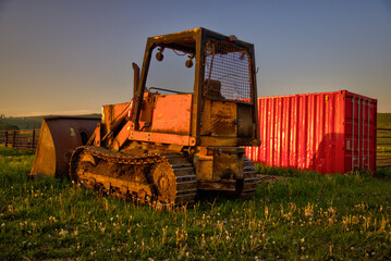 Longview, Alberta - June 8, 2025: Out buildings and landscapes on the Tongue Creek Ranch at sunset

