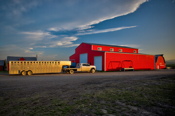 Longview, Alberta - June 8, 2025: Out buildings and landscapes on the Tongue Creek Ranch at sunset 