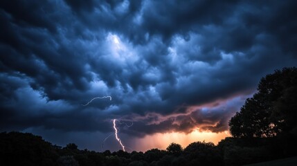 A dramatic lightning strike under dark storm clouds at sunset creating a stunning nature scene.