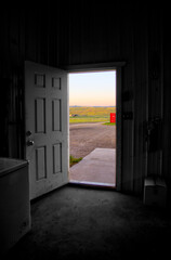 Longview, Alberta - June 8, 2025: Out buildings and landscapes on the Tongue Creek Ranch at sunset 