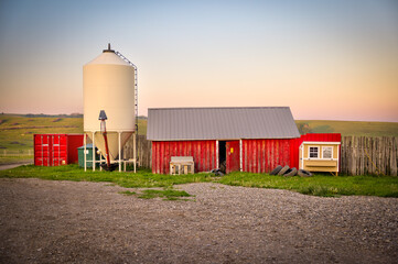 Longview, Alberta - June 8, 2025: Out buildings and landscapes on the Tongue Creek Ranch at sunset 