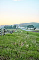 Longview, Alberta - June 8, 2025: Out buildings and landscapes on the Tongue Creek Ranch at sunset 