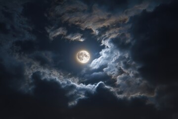 Full Moon Glowing Through Dark Clouds in Night Sky Celestial Atmosphere