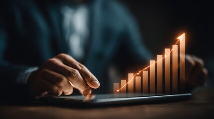 Positive Business Performance: Financial Graph & Man Using Tablet