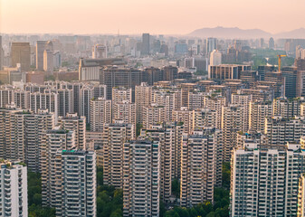 Aerial view of urban landscape during sunset. China, Hangzhou.