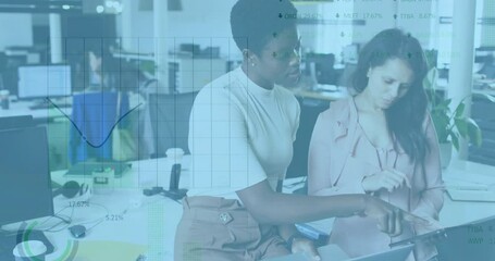 After receiving digital pen, two coworkers analyzing business data and animating transparent charts - Powered by Adobe