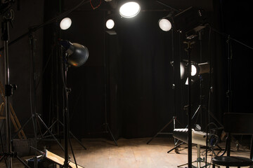 empty studio with lighting equipment for background