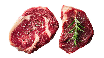 Obraz premium Two juicy beef steaks with herbs on a white isolated background.