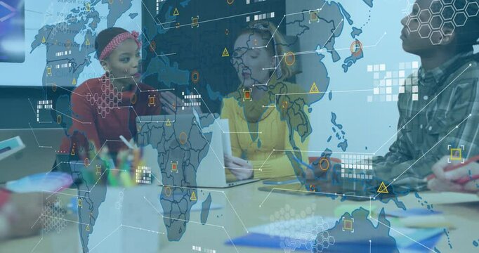 Three colleagues analyzing business data, network graphic fading in, pointing at laptop screen