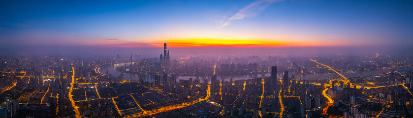 Panoramic Aerial view of Shanghai skyline in downtown at sunrise.
