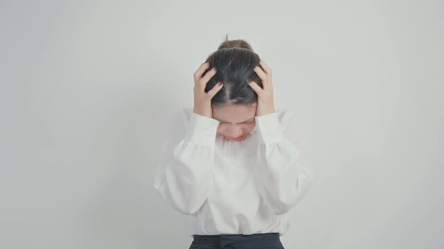 Business Woman having headache and Dizzy for concepts of Chronic Stress, Headache and Migraine, World Brain Tumor day, Brain Cancer, Brain Stroke, Dementia, alzheimer, Hypotension and mental health