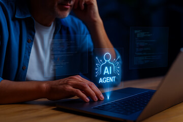 Futuristic AI Agent Hologram Displayed on Laptop Screen While a Man Interacts with Digital Interface – Artificial Intelligence and Virtual Assistant Concept
