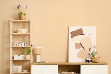 Stylish interior of modern room with beautiful Muscari flowers and poster