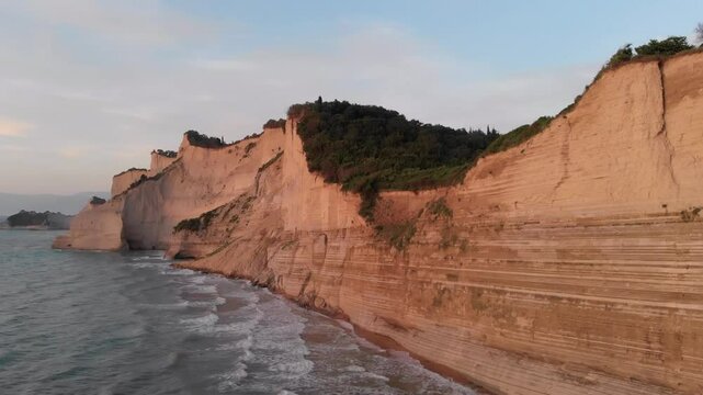 This footage captures the breathtaking beauty of Logas Beach, also known as Sunset Beach, in Peroulades, Corfu, Greece.