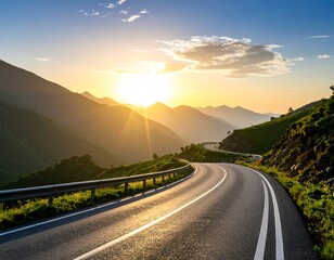 Winding road through mountains at sunset (1)